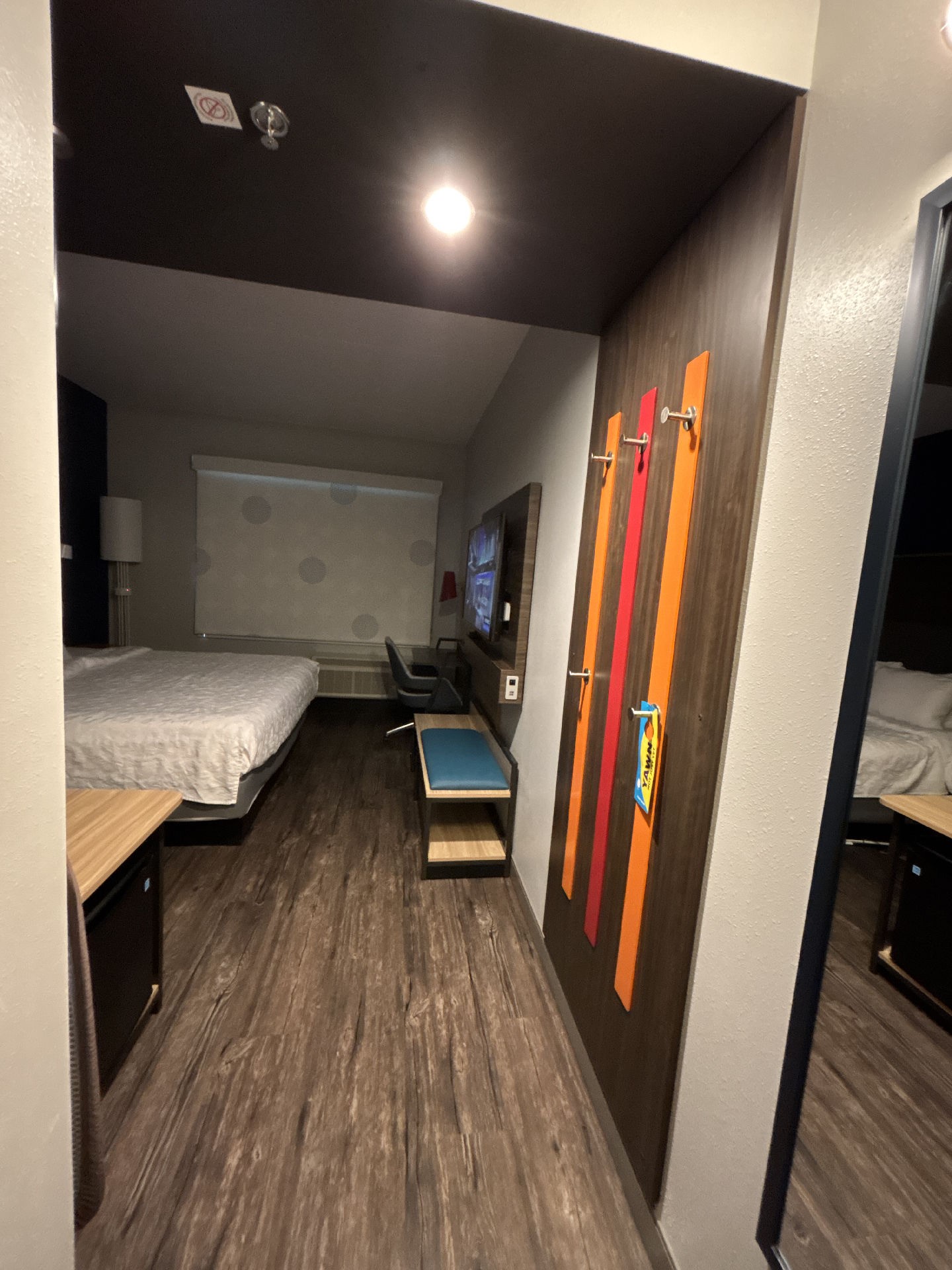 A view of the Tru By Hilton Macon North Hotel Room containing a TV, bed, and other equipment